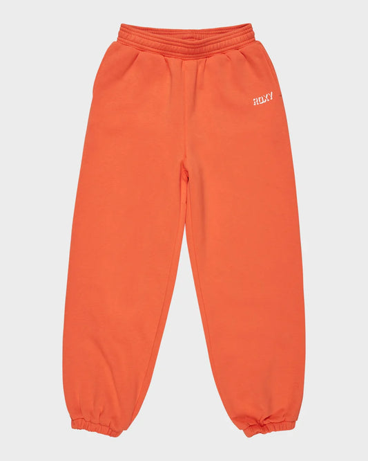 Roxy Active Teenager Jogger Trackpants in vibrant orange with elastic cuffs and white Roxy logo on hip.