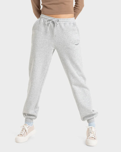 Front view of Roxy Perfect Place Pant Brushed Trackpant worn with beige long sleeve top and beige sneakers.