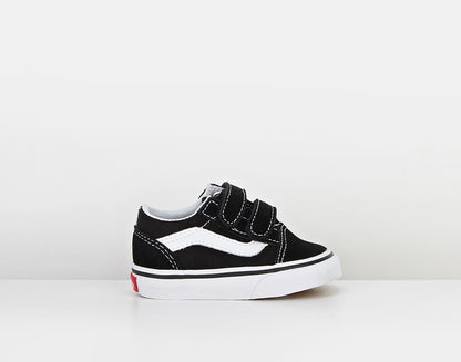 Side view of Vans Old Skool V Toddler shoe in black with white side stripe and velcro straps.